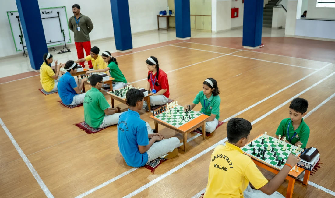 Students playing chess and indoor games at Sanskriti School Pune